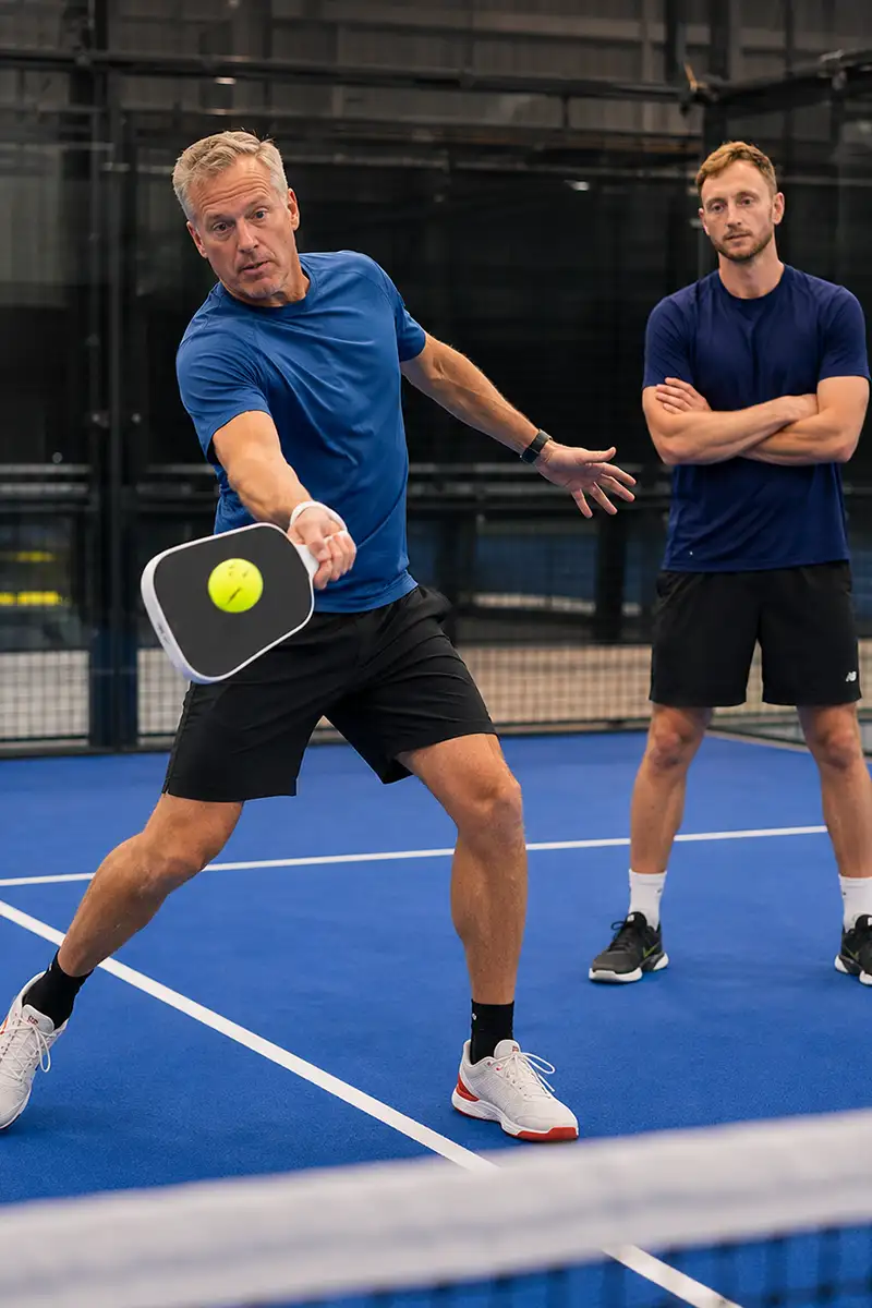 Pickleball coaching session on indoor courts at Advantage Padel, Mudeford, Christchurch